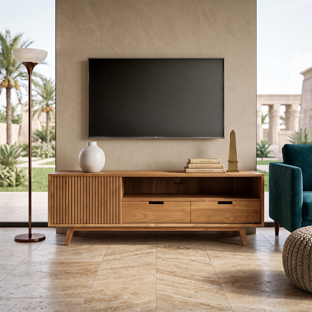 A light natural wood TV stand or media console with slatted cabinet doors, two drawers, and open shelving, shown in a styled living room setting with a wall-mounted TV, bowl, and rug.
